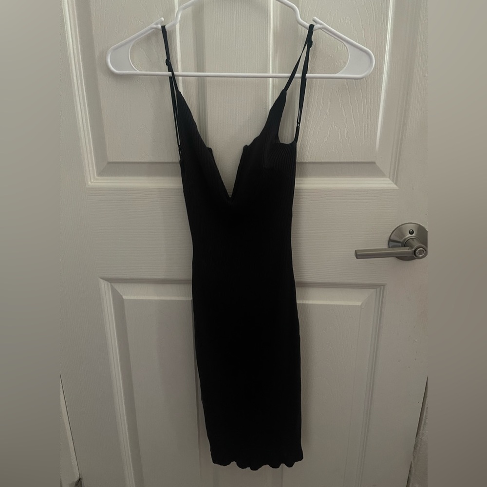 Black low cut mini dress size small